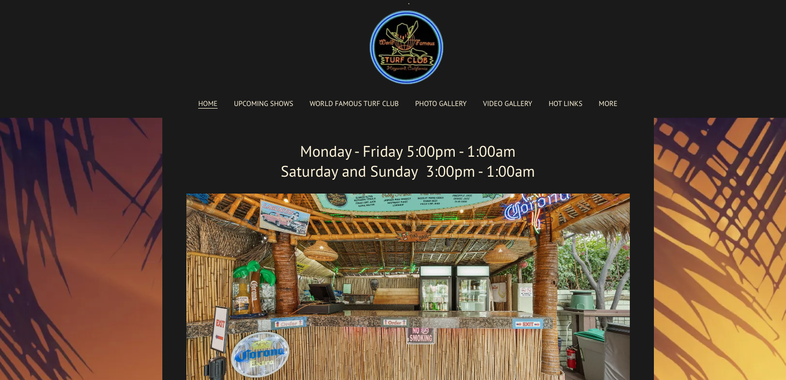 Tropical-themed bar with bamboo decor and colorful signs.