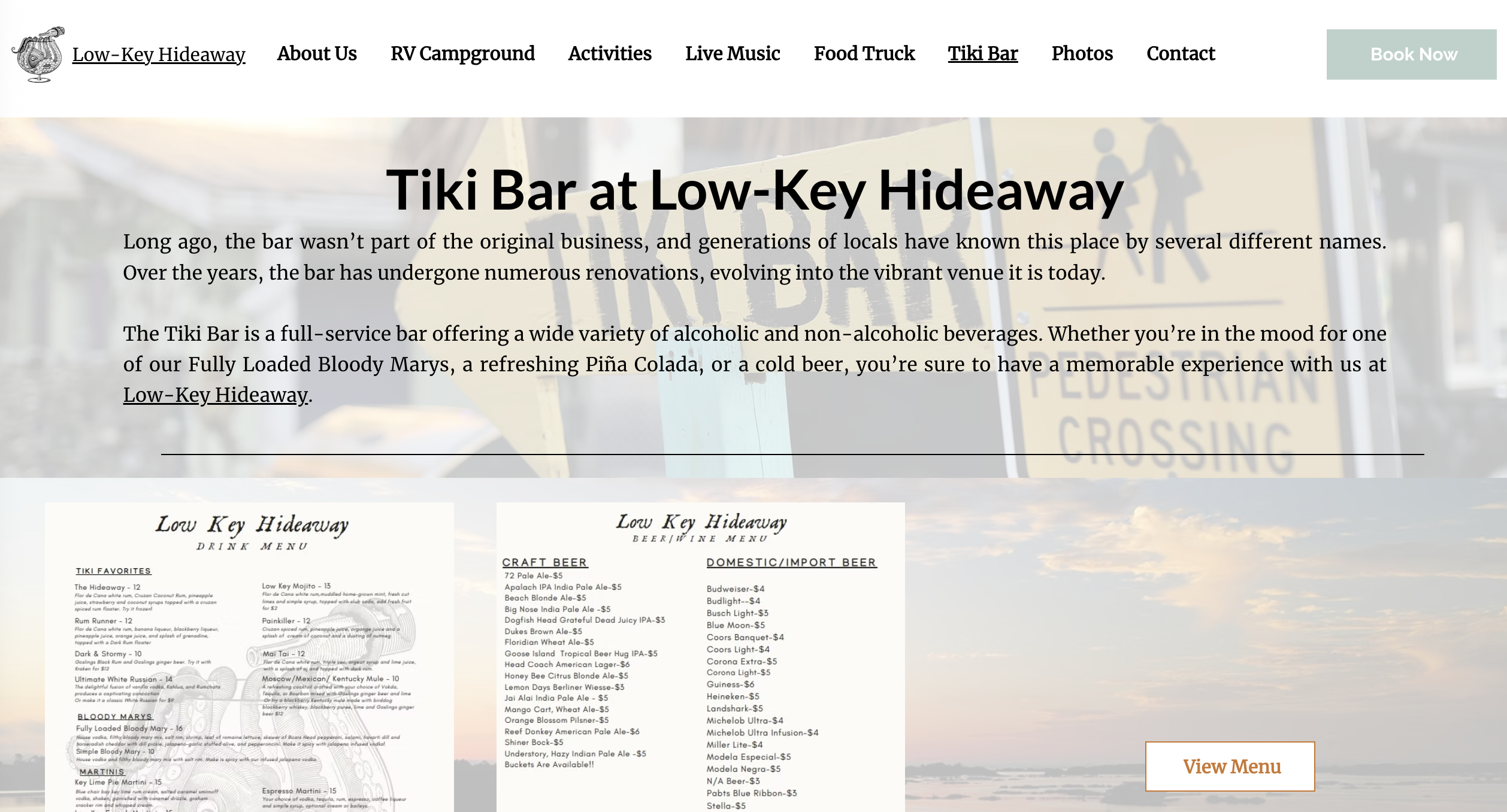 Tiki bar website with navigation menu and sunset background.