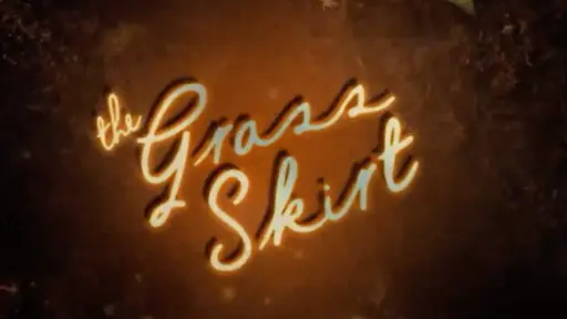 Glowing cursive text reads "the Grass Skirt" on a dark, textured background.