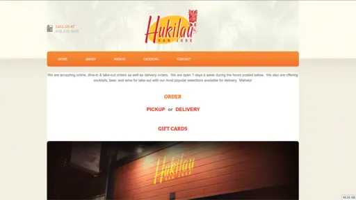 Website with a restaurant logo, navigation menu, and ordering options.