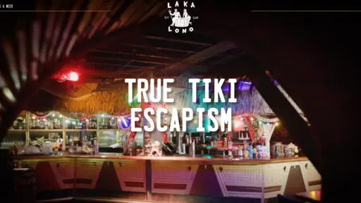 Tiki bar with colorful lights and decor.