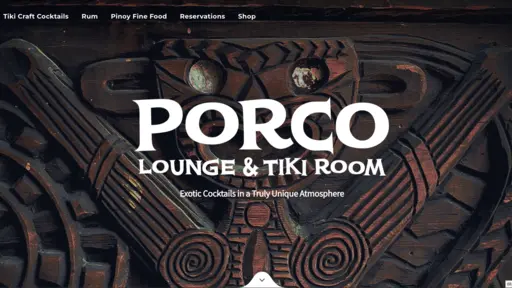 Porco sign on carved wooden tiki backdrop.