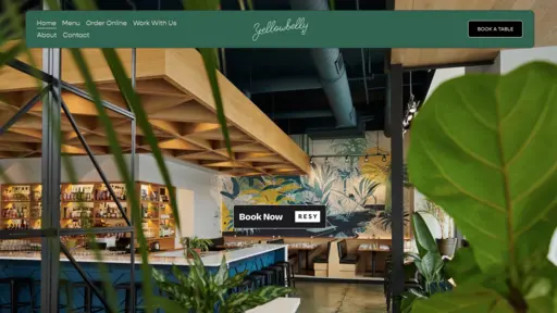 Modern restaurant interior with mural and plants.