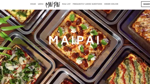 Assorted square pizzas with various toppings in trays.